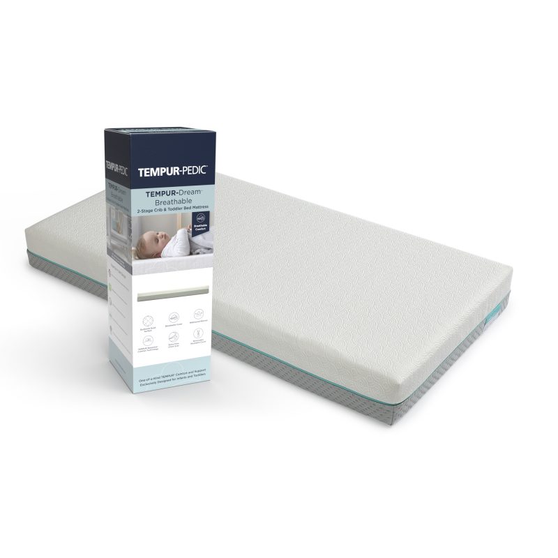 CM001 laying down next to mattress box